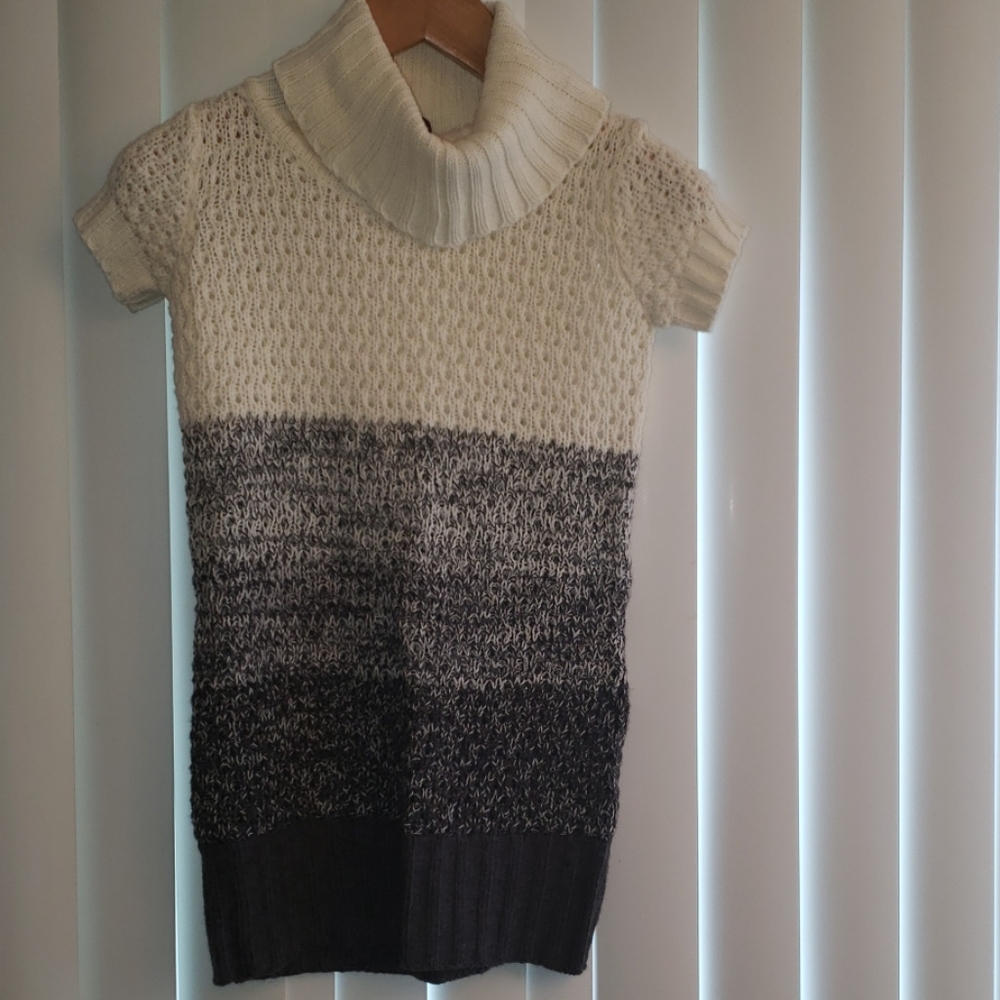 Poof Girl sweater Turtleneck